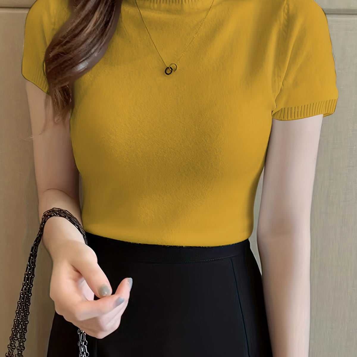 Della | Elegancki top z golfem 10