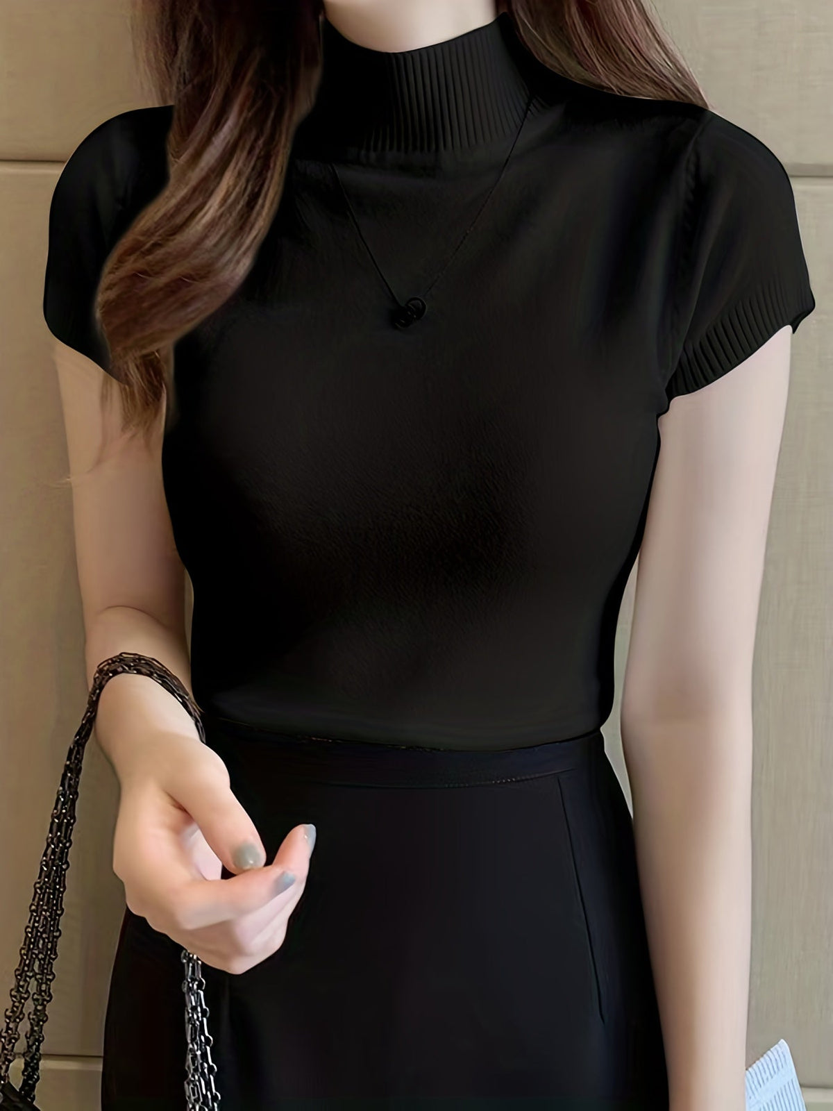 Della | Elegancki top z golfem 2