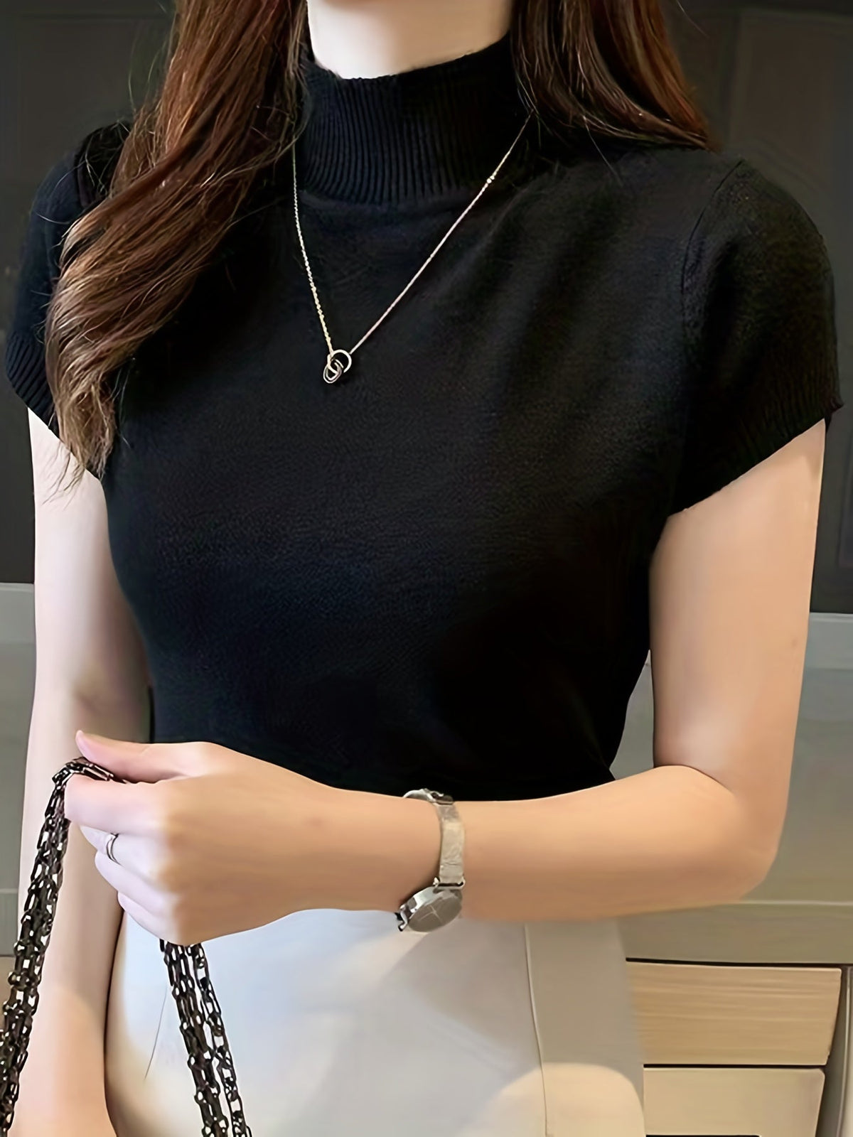 Della | Elegancki top z golfem 3