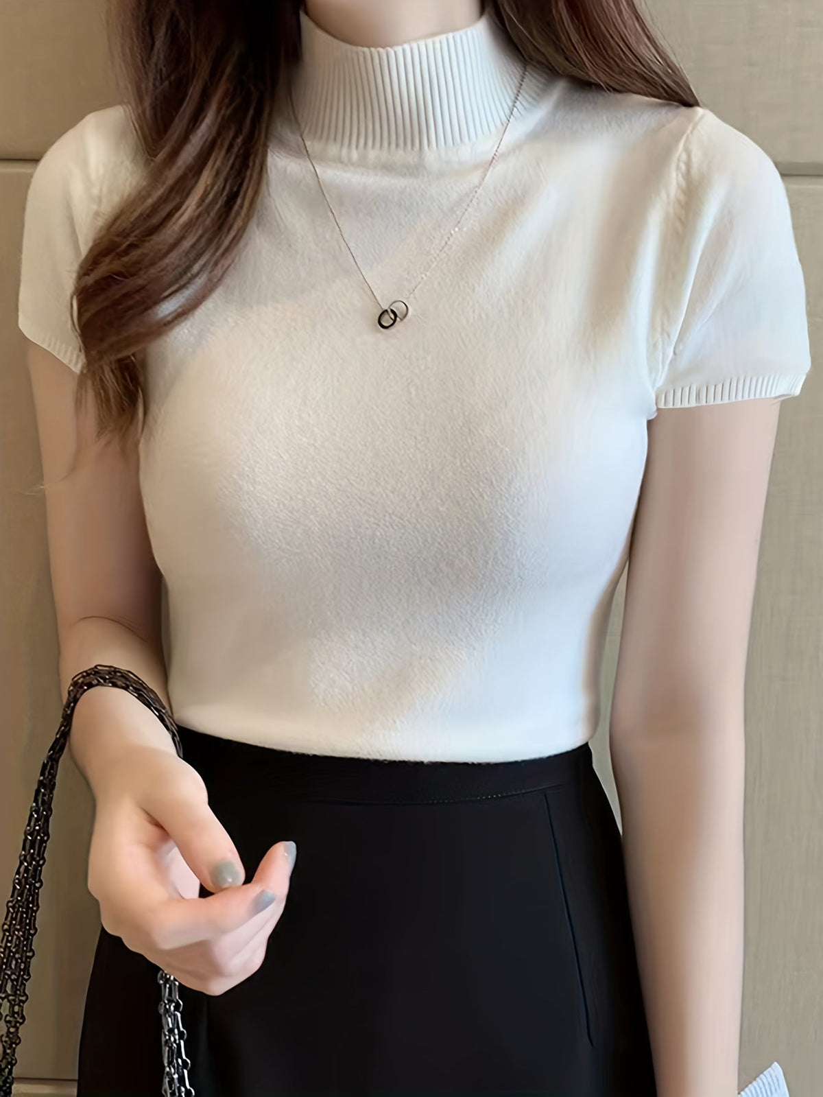Della | Elegancki top z golfem 6