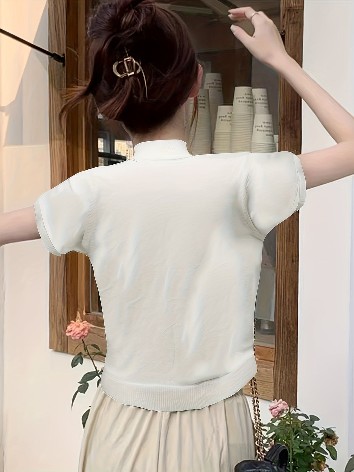 Della | Elegancki top z golfem 7
