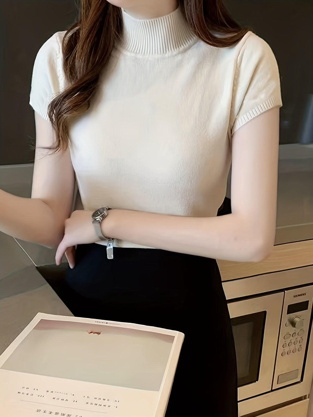 Della | Elegancki top z golfem 8